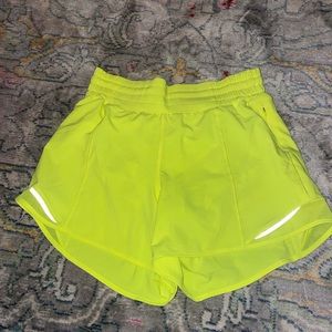 Highlight yellow hotty hot high rise lululemon athletic shorts 4”.